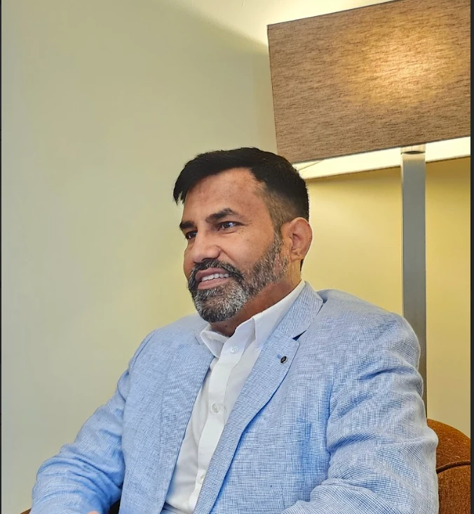 Dr. Trilok Singh